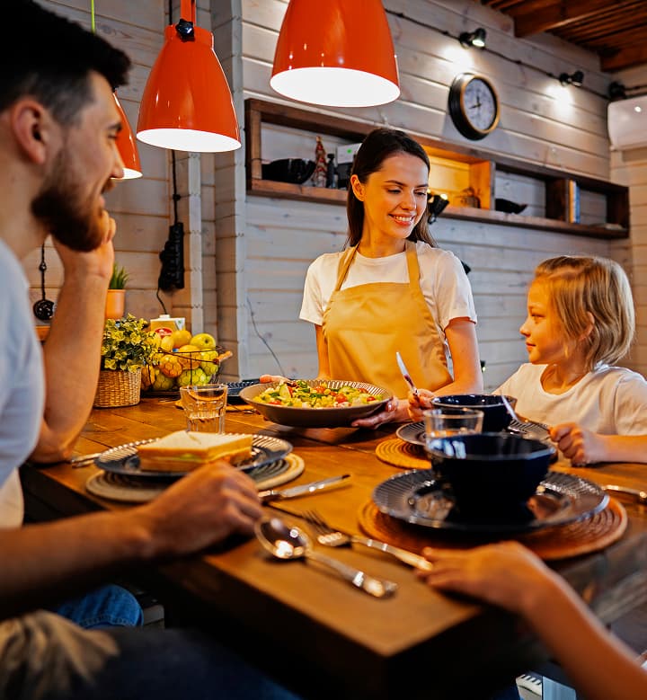 Two people at home, browsing Hearthfare together on a tablet